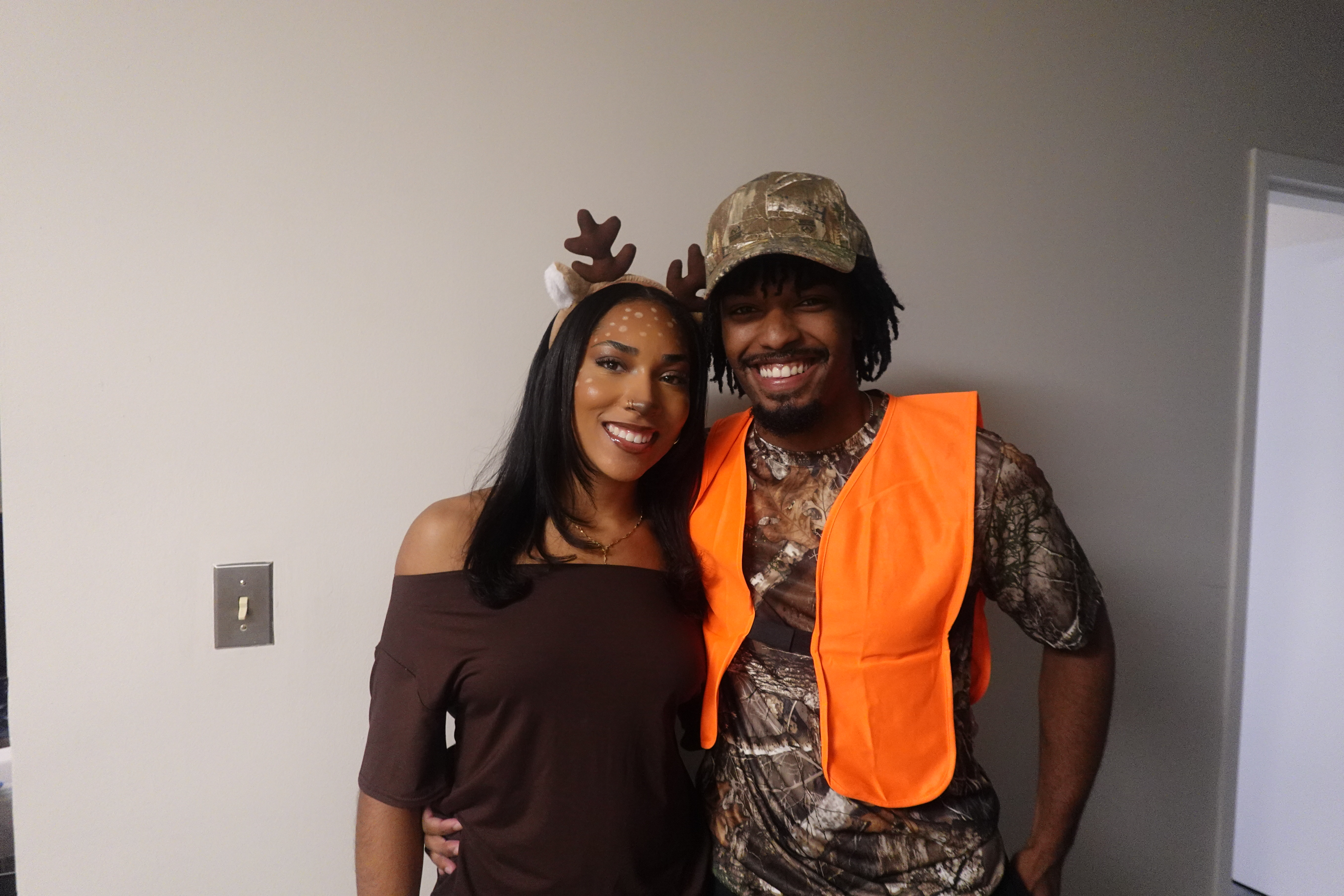 Jaden and his girlfriend smiling together in costumes
